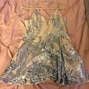 A light pink glitter dress! Never worn so in new condition.